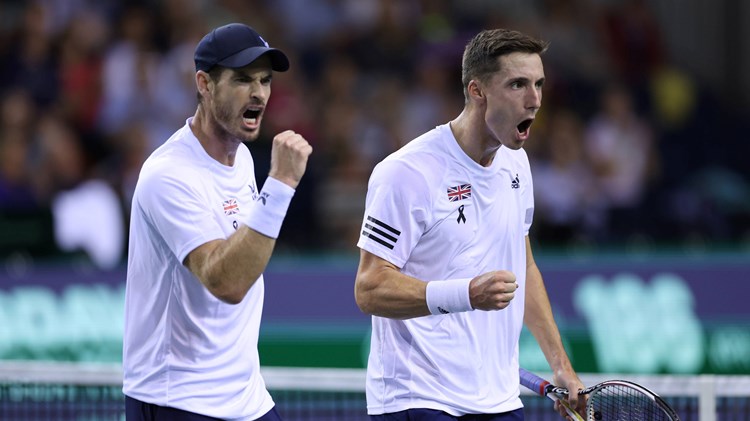 Andy Murray and Joe Salisbury celebrate winning a point at the Davis Cup Finals in 2022