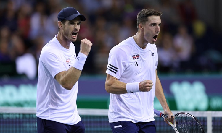 Andy Murray and Joe Salisbury celebrate winning a point at the Davis Cup Finals in 2022