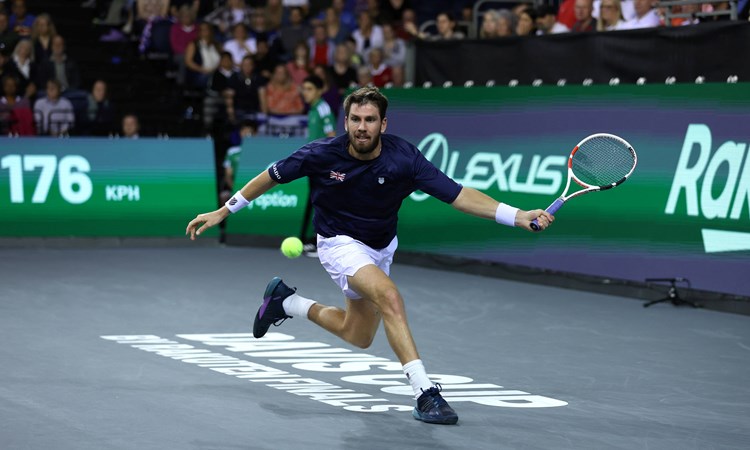 Cam Norrie stretches for a forehand in the Davis Cup tie with Netherlands