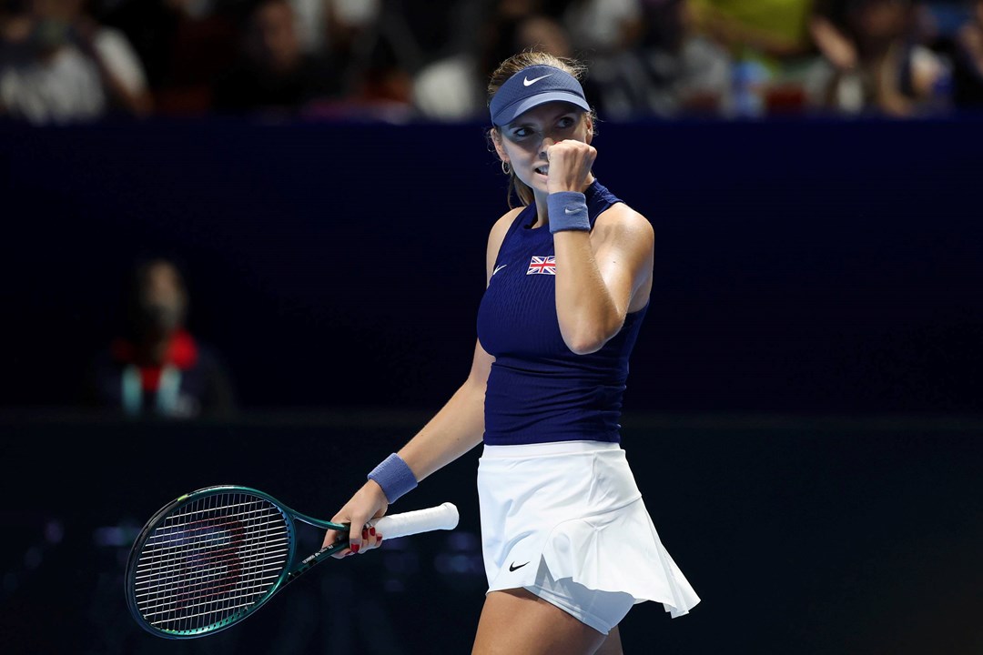 British tennis player Katie Boulter clenching her fist on court after winning a point during Great Britain's Billie Jean King Cup tie against Japan