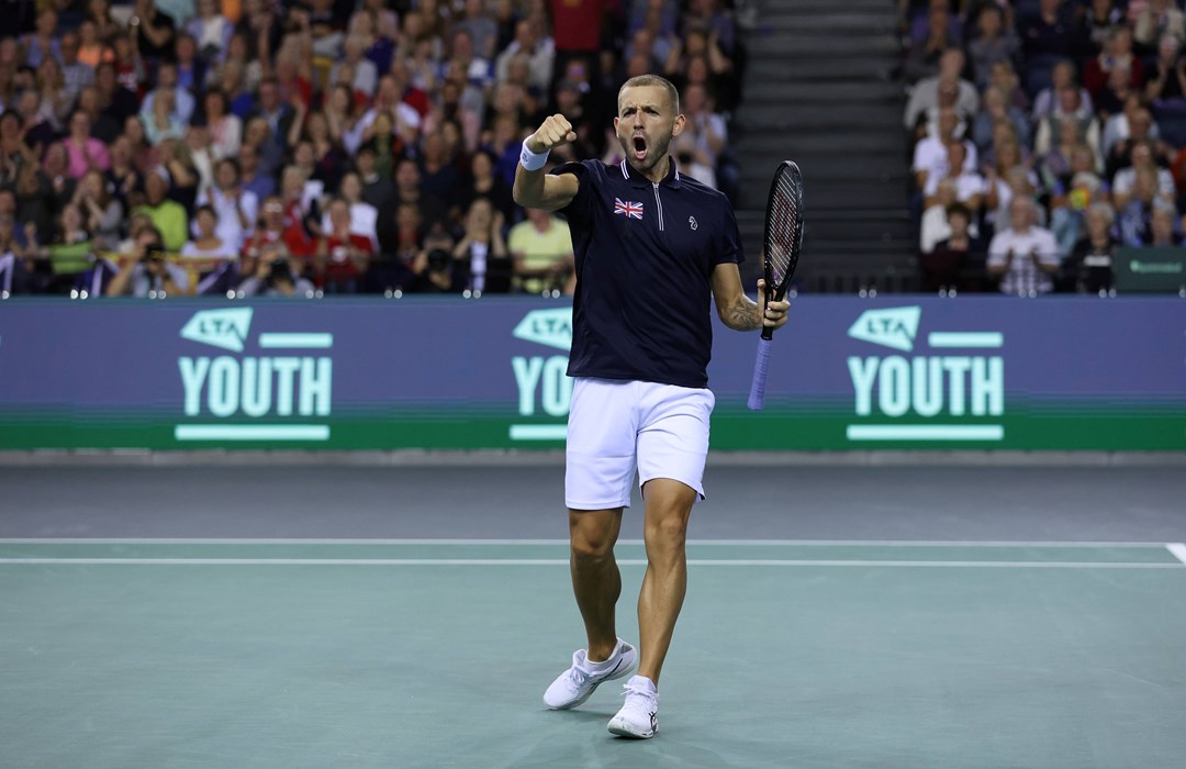 Dan Evans celebrates a singles victory over Netherlands at the Davis Cup