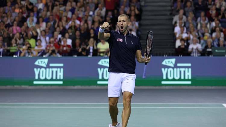Dan Evans celebrates a singles victory over Netherlands at the Davis Cup