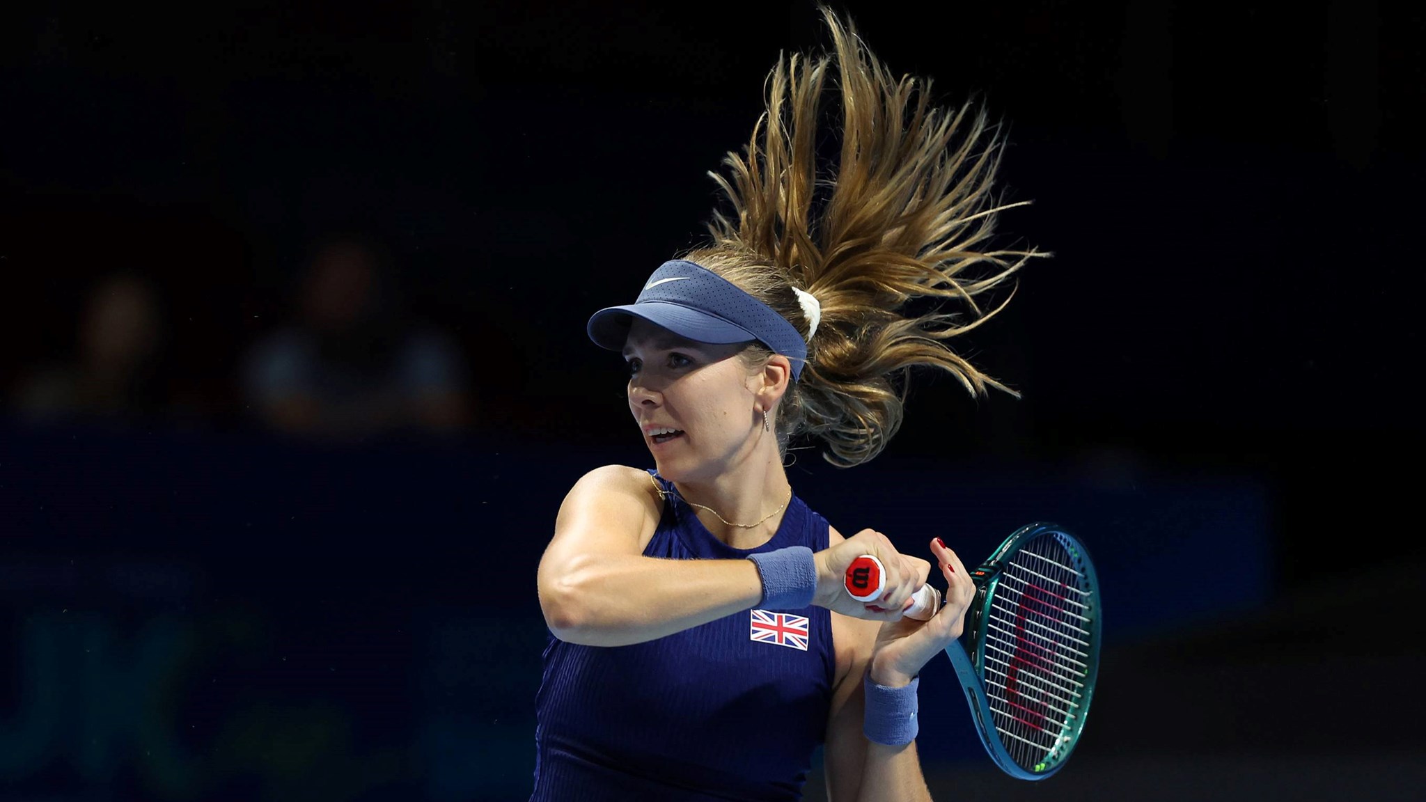 Katie Boulter hits a forehand in the Billie Jean King Cup Finals against USA