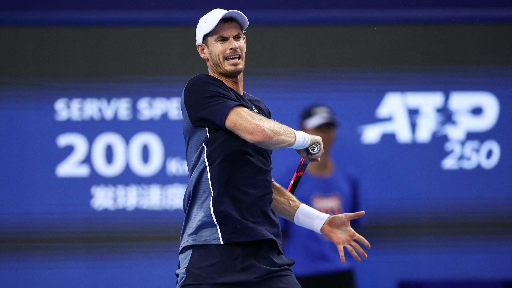 Andy Murray hitting a forehand on court