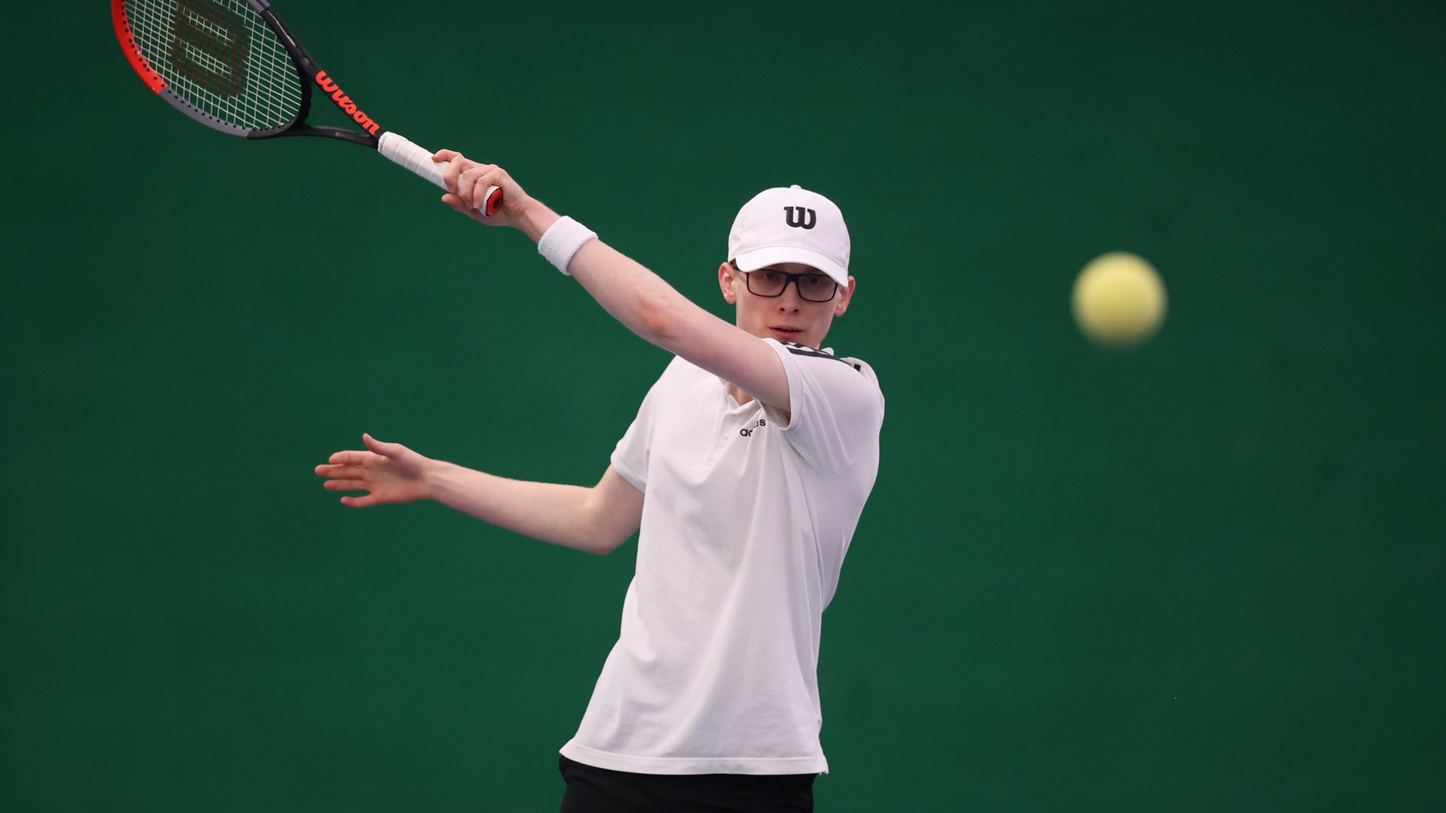 Ewan Hayward competes during the Visually Impaired Tennis National Finals 2023 at Wrexham Tennis Centre on November 19, 2023 in Wrexham, Wales. 