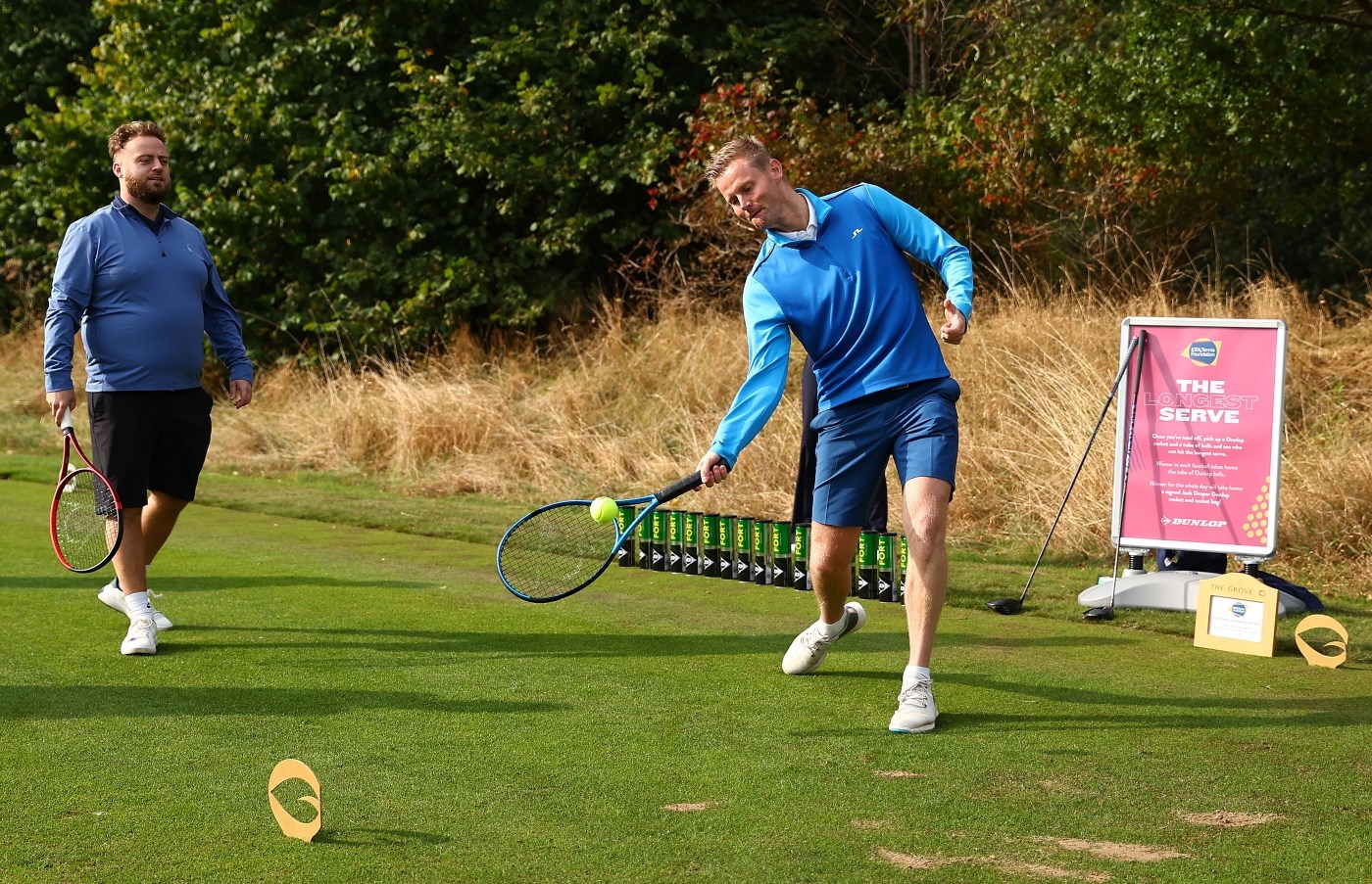 Man taking part in Longest Serve competition at LTA Tennis Foundation Golf Day 