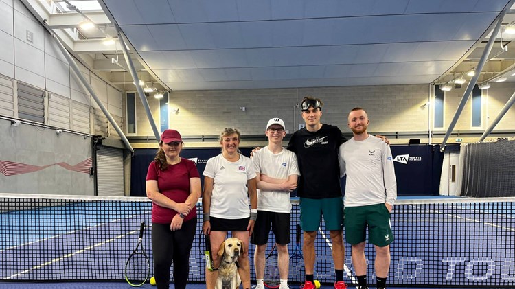 Jack Draper on court with some of the Visually Impaired GB players