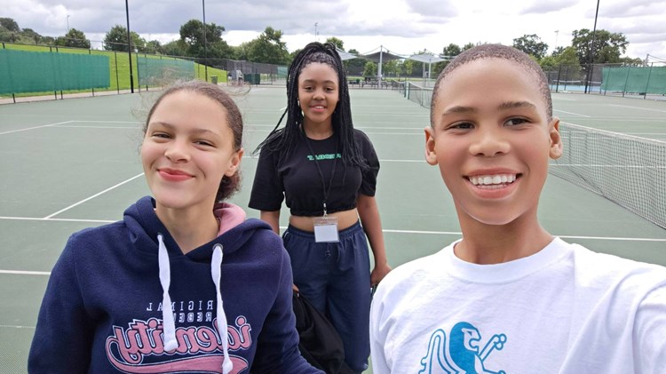 A group of players playing tennis at Harrow through the Government's HAF programme