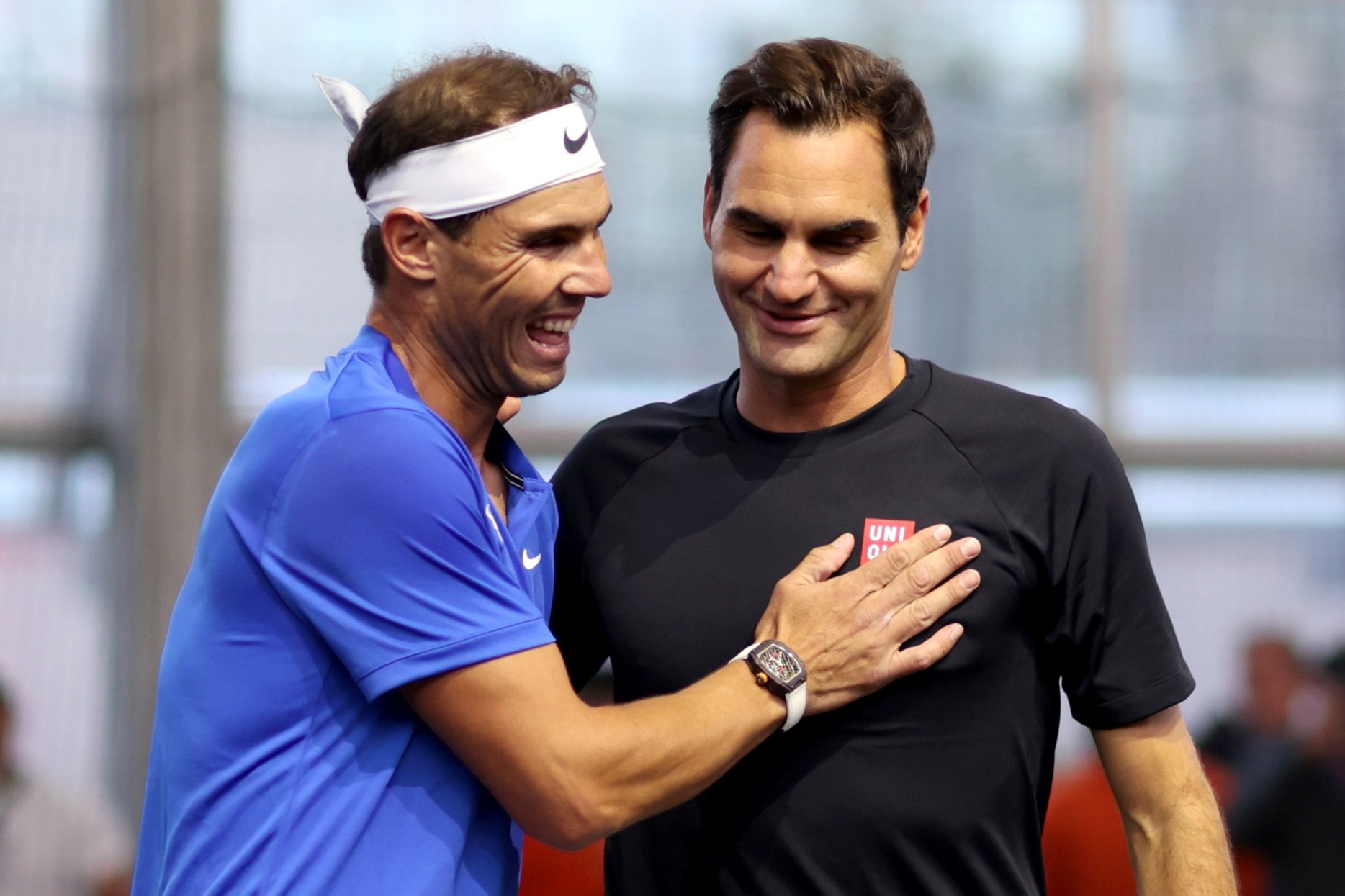 Rafael Nadal and Roger Federer of Team Europe interact during a practice session during Day One of the Laver Cup at The O2 Arena