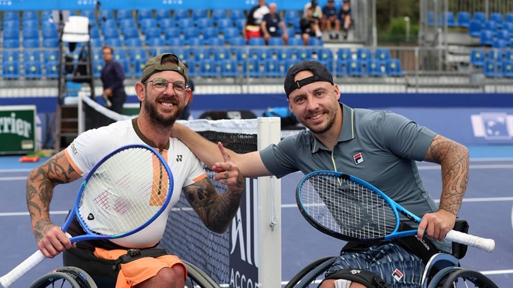 Australia's Heath Davidson and Britain's Andy Lapthorne smiling on court at the French Riviera Open