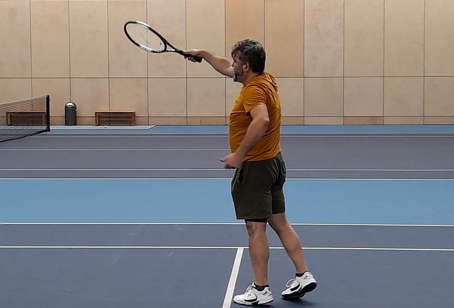 Player hitting a volley at the Lee Valley tennis centre
