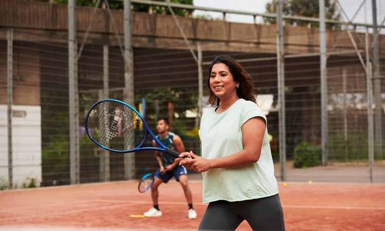 Tennis player on court ready for a shot