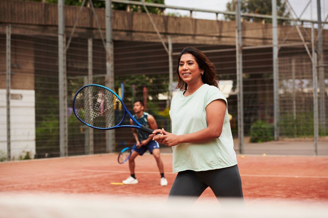 Tennis player on court ready for a shot