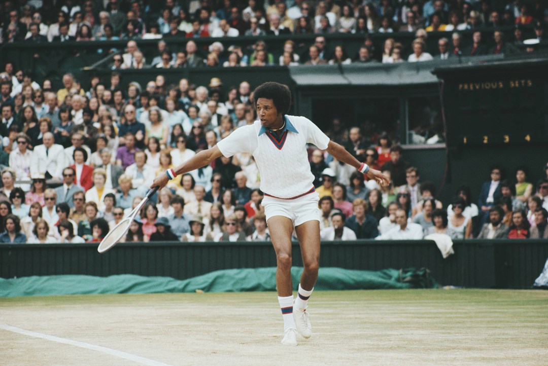 Arthur Ashe hitting a backhand on Centre Court at Wimbledon
