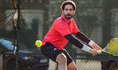 Player hits a backhand 
