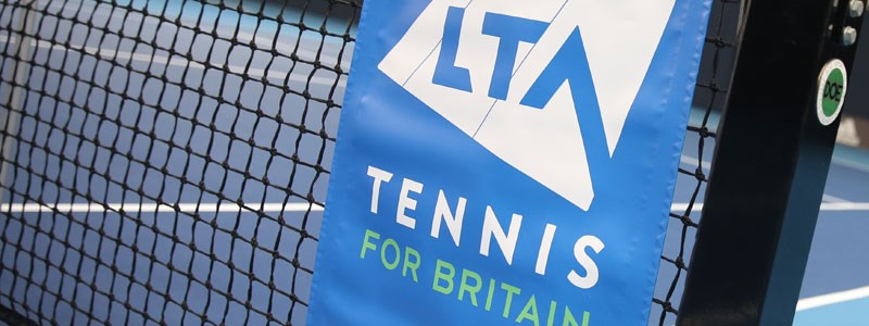 tennis net with LTA branding on