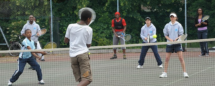 Tennis for free event at a local tennis court
