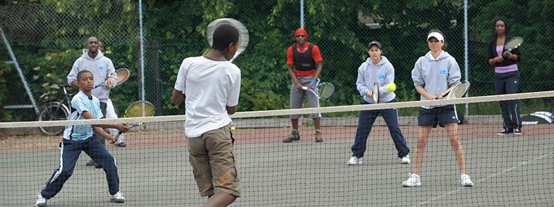 Tennis for free event at a local tennis court