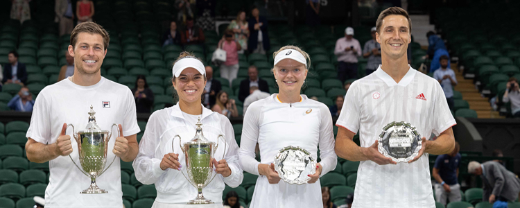 Joe Salisbury, Harriet Dart, Desirae Krawczyk and Neal Skupski holding trophies