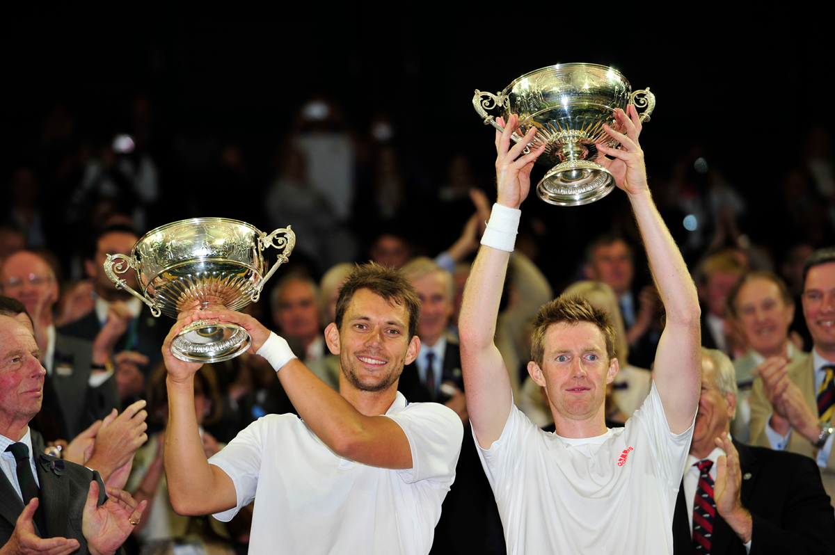 Britain's Jonny Marray and Denmark's Frederik Nielsen after winning the men's doubles at Wimbledon in 2012