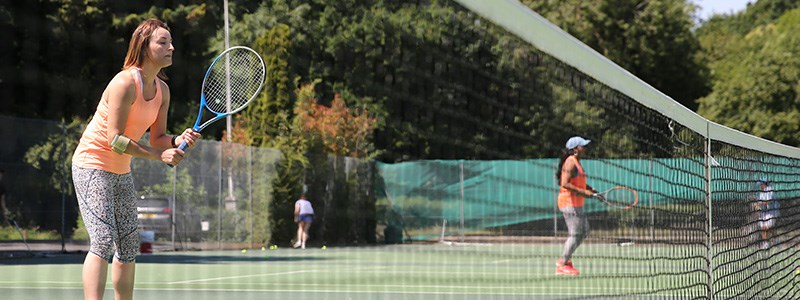 Women playing on outdoor court