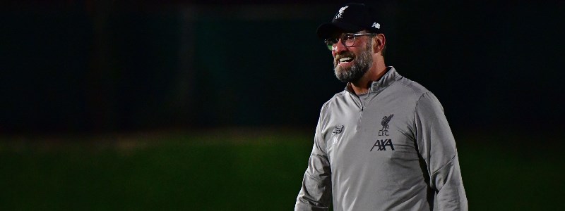 Jurgen Klopp smiling in his Liverpool uniform