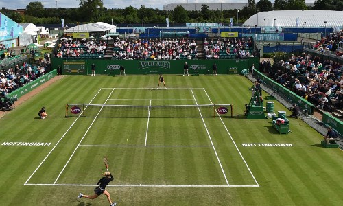 Players on grass tennis court during the Nottingham Open