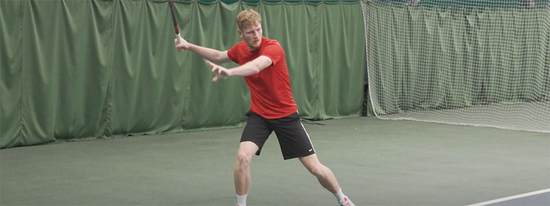 noah-burton-playing-tennis.png