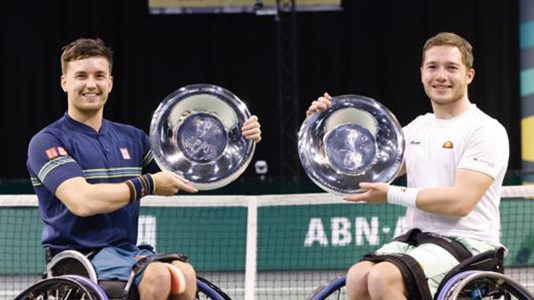 Alfie Hewett and Gordon Reid with their trophy in Rotterdam