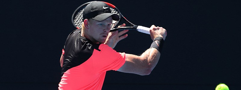 Kyle Edmund playing a backhand shot at the 2018 Australian Open