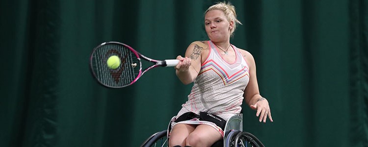 Wheelchair women tennis player Jordanne Whiley playing a forehand shot