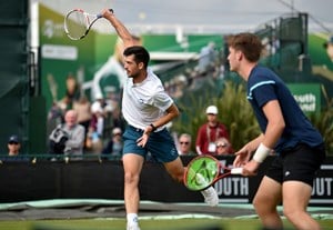Julian Cash reacting during the men's doubles final at the 2022 Rothesay Open, Nottingham