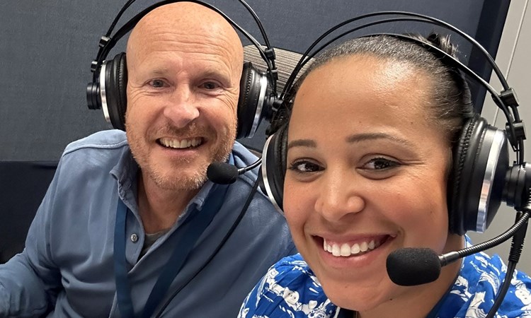 Yasmin Clarke in the broadcasting booth with Paul Hand