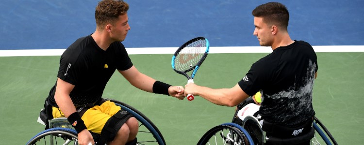 Alfie Hewett and Gordon Reid playing a tennis match