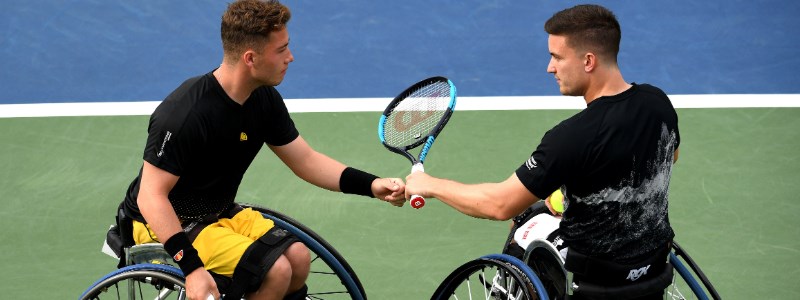 Alfie Hewett and Gordon Reid playing a tennis match