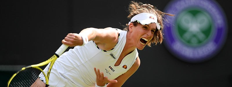 Johanna Konta serving a tennis shot at Wimbledon