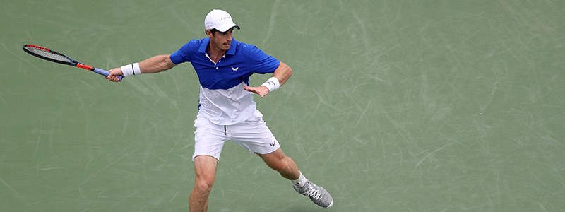 Andy Murray about to return the tennis ball in a match