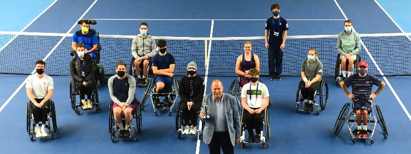 David Rawlinson presented with tennis Europe wheelchair tennis award on court at the National Tennis Centre