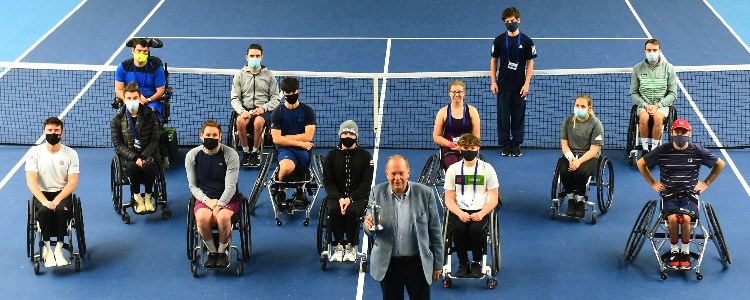 David Rawlinson presented with tennis Europe wheelchair tennis award on court at the National Tennis Centre
