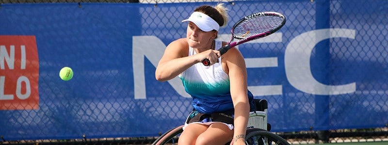 Jordanne Whiley hits a backhand at the 2019 NEC Wheelchair Singles