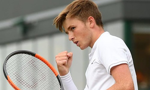 Aiden McHugh celebrating a win at Wimbledon