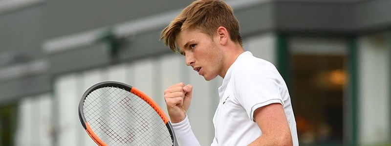 Aiden McHugh celebrating a win at Wimbledon