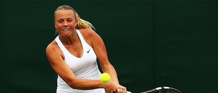 Anett Kontaveit playing a double forehand shot