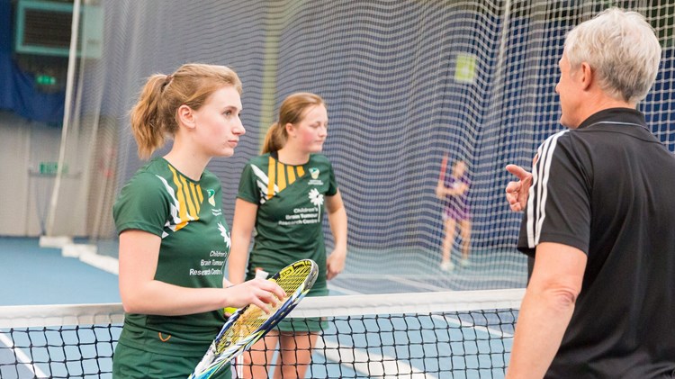 Two tennis students