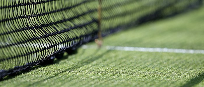 Close up of the bottom of a tennis net
