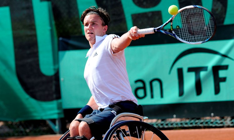Gordon Reid playing a tennis shot