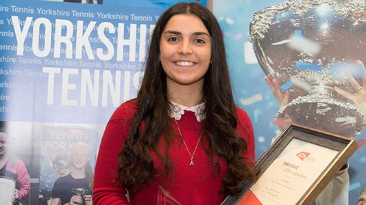 Alice Robson receiving Development Coach of the Year award