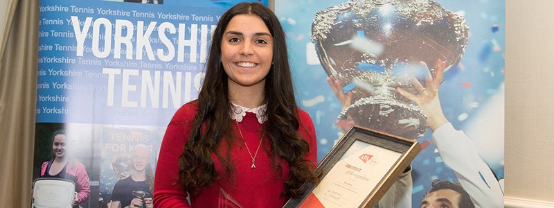 Alice Robson receiving Development Coach of the Year award