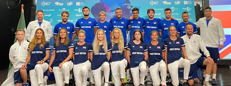 GB womens padel team lined up at the front kneeling on one leg with mens padel team lined up standing behind