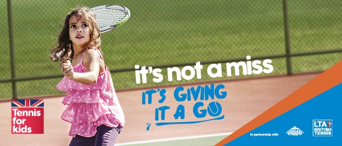 Young girl playing tennis for Tennis for Kid